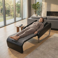 Woman relaxing on the Ceragem Master V7 at home