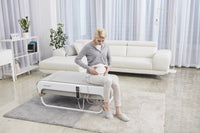 Sitting on the Ceragem Master V4 in a living room