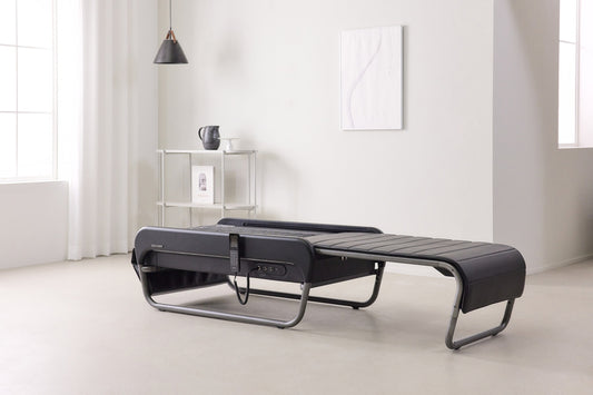 Ceragem Master V5 in black, open in a living room