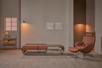 Ceragem Master V5 in brown with a lounge chair